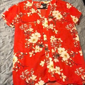 Small orange floral top